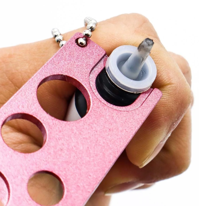 DÉCAPSULEUR POUR FLACON DE COLLE