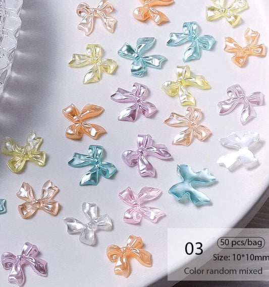 Décoration nails noeuds pastels